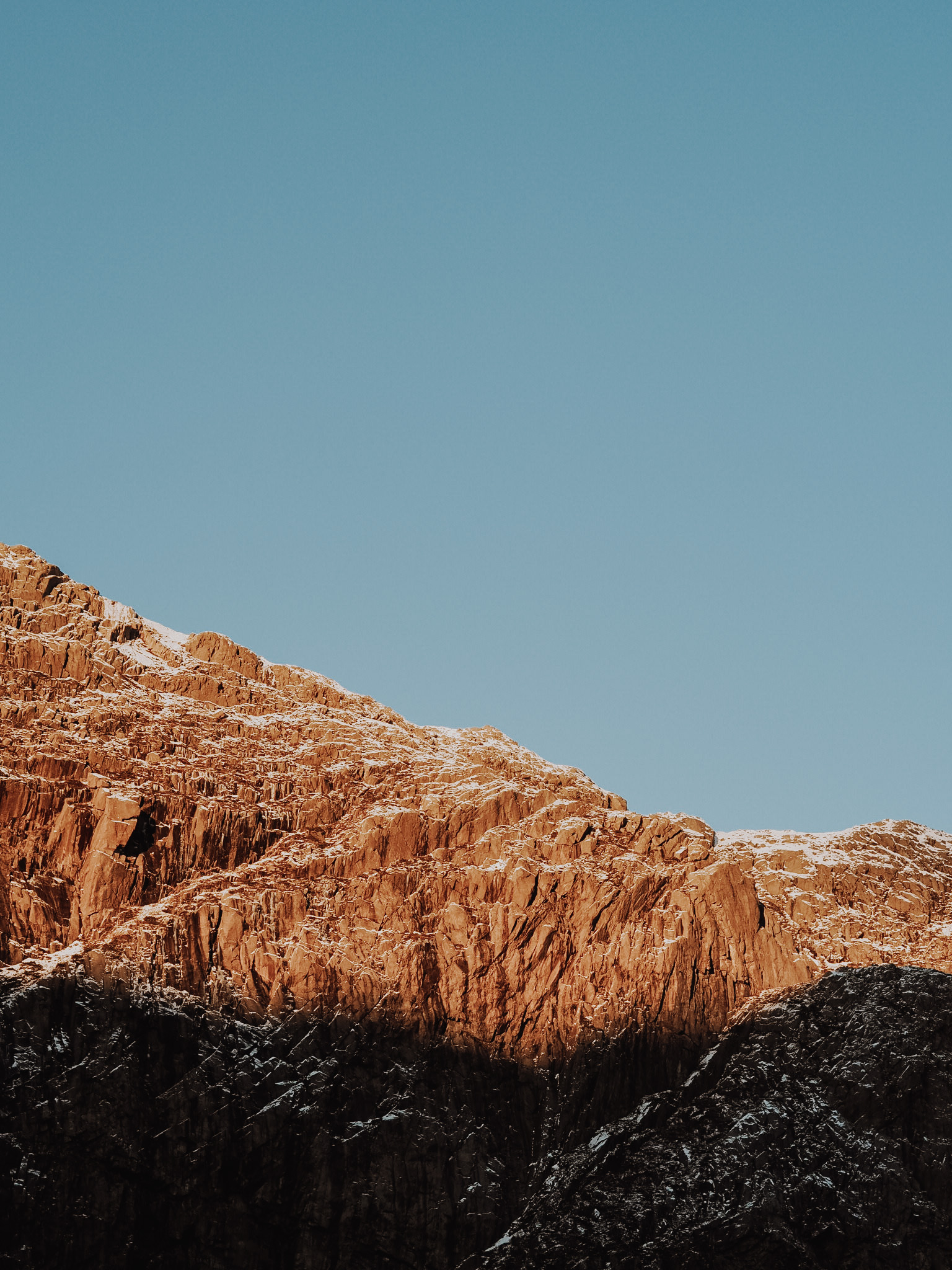 picture of a mountain with blue sky